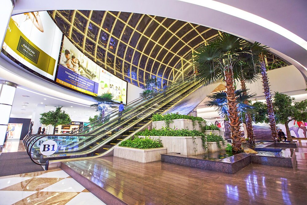 The space inside Vincom Mega Mall Times City is large and modern, with many stalls selling fashion and cosmetics